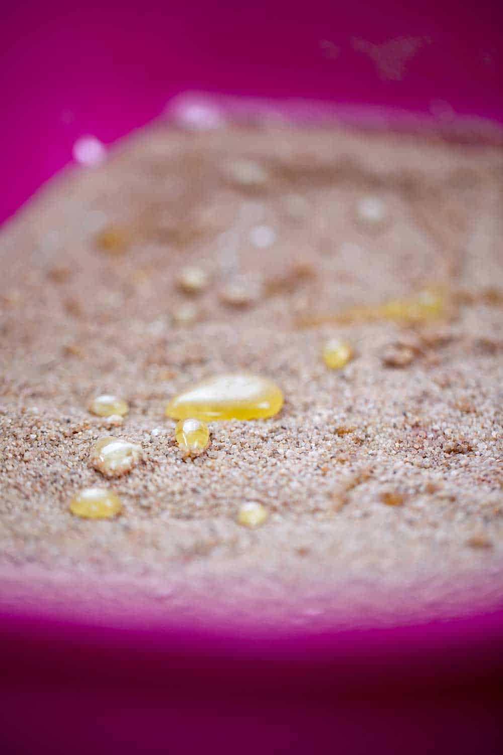 Water repellent cat sand in litter box with cat urine
