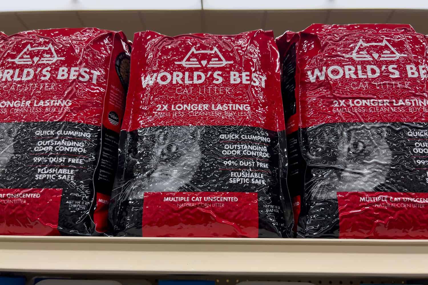 Close up view of Worlds Best cat litter for sale inside a grocery store.